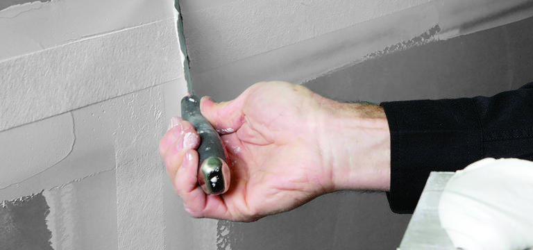 hand gliding overall drywall tape